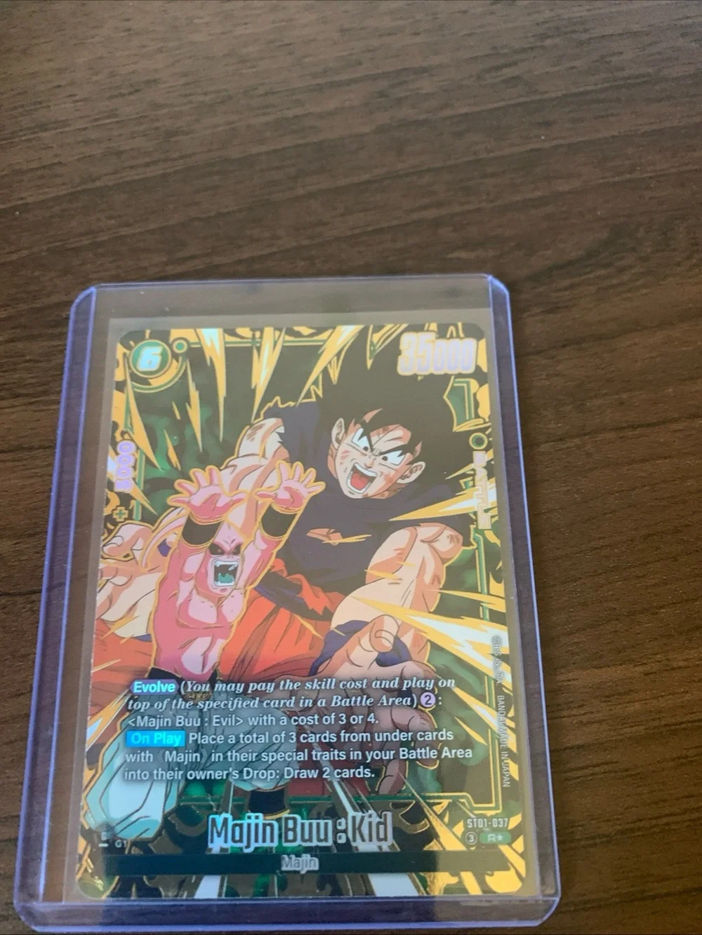 Majin Buu & Kid Goku Holographic Trading Card Sleeve — Green & Gold Artwork